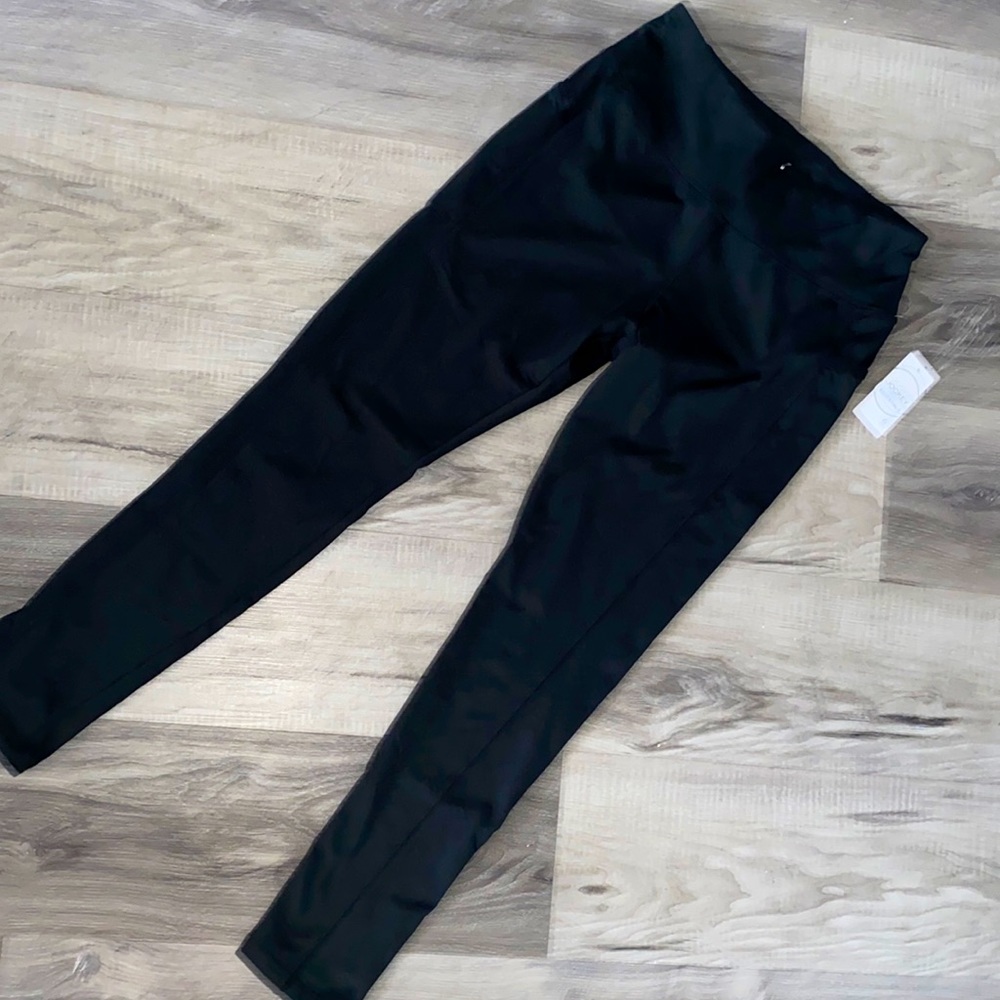 Black leggings with tags.